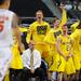 The Michigan bench reacts to a three-point basket by freshman Nik Stauskas during the first half against Florida at Cowboys Stadium on Sunday, March 31, 2013. Melanie Maxwell I AnnArbor.com